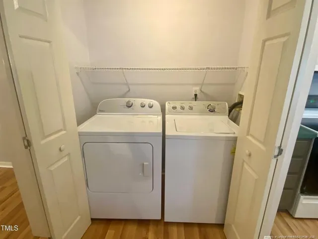 a bathroom with a toilet and shower