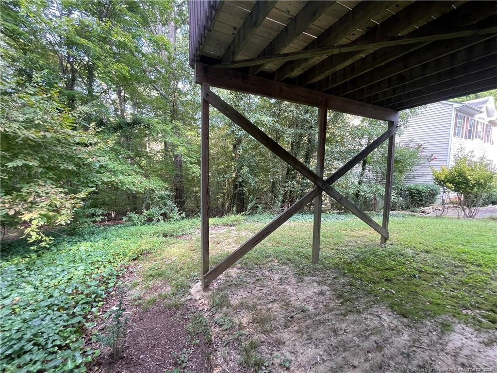4219 Arbutus Drive, Unit A Raleigh, NC 27612 - Photo 29 of 30 a view of porch with a backyard