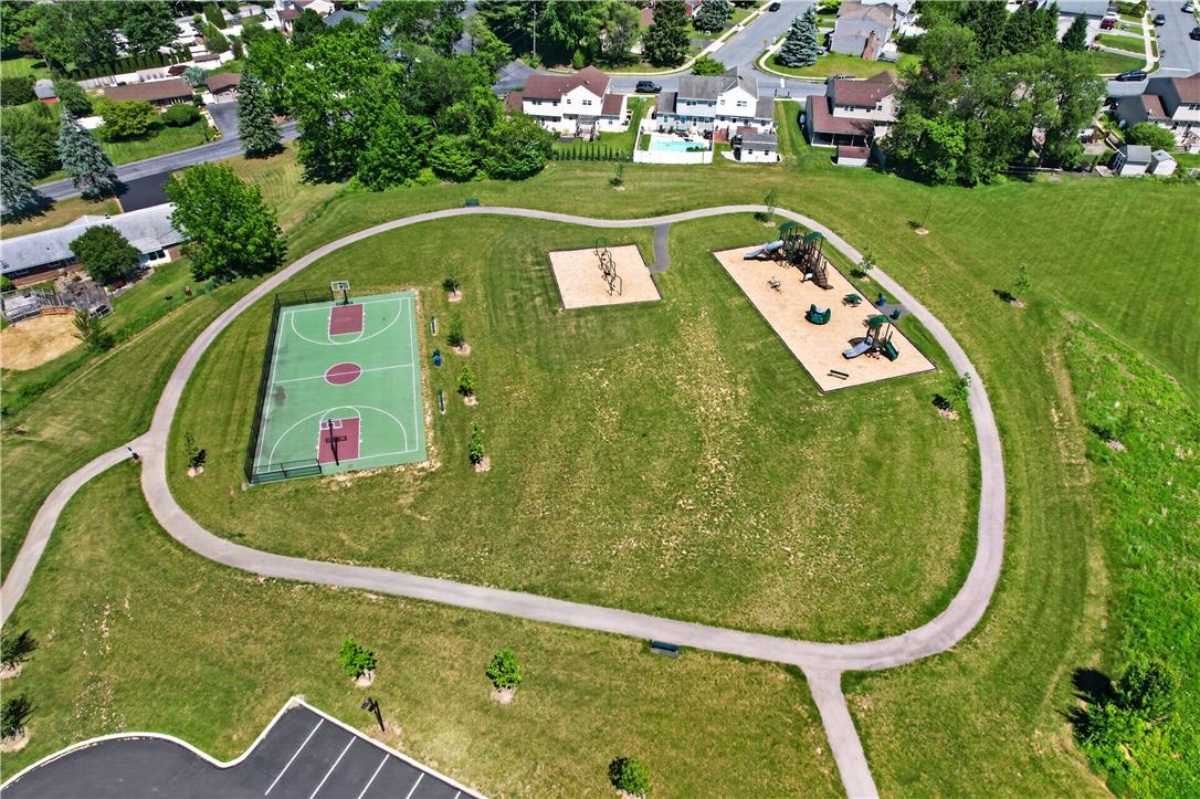 4502 Benjamin Court Emmaus, PA 18049 - Photo 46 of 48 An aerial perspective reveals a vibrant community park with recreational courts and play areas.