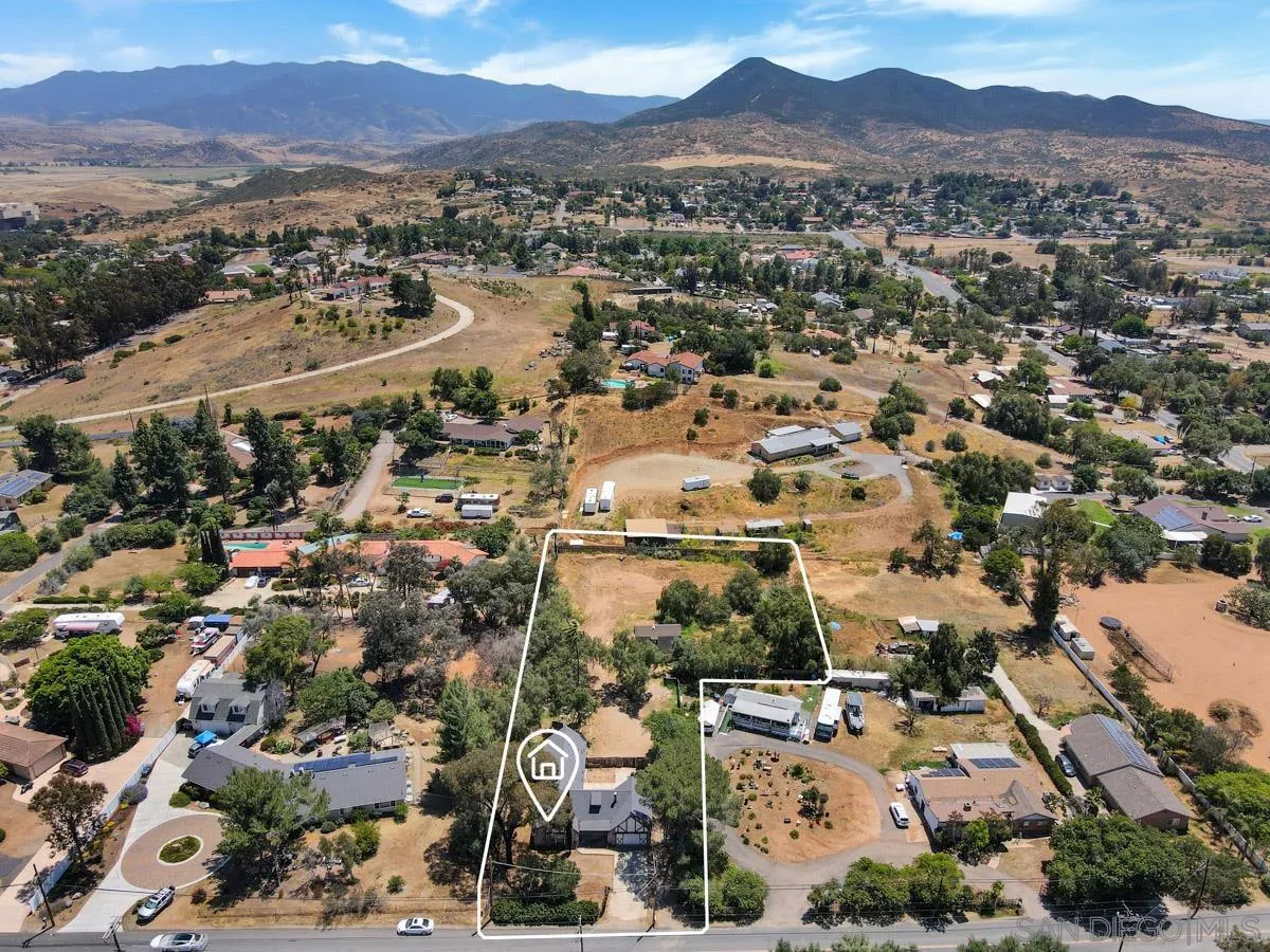 an aerial view of a city with lots of residential buildings