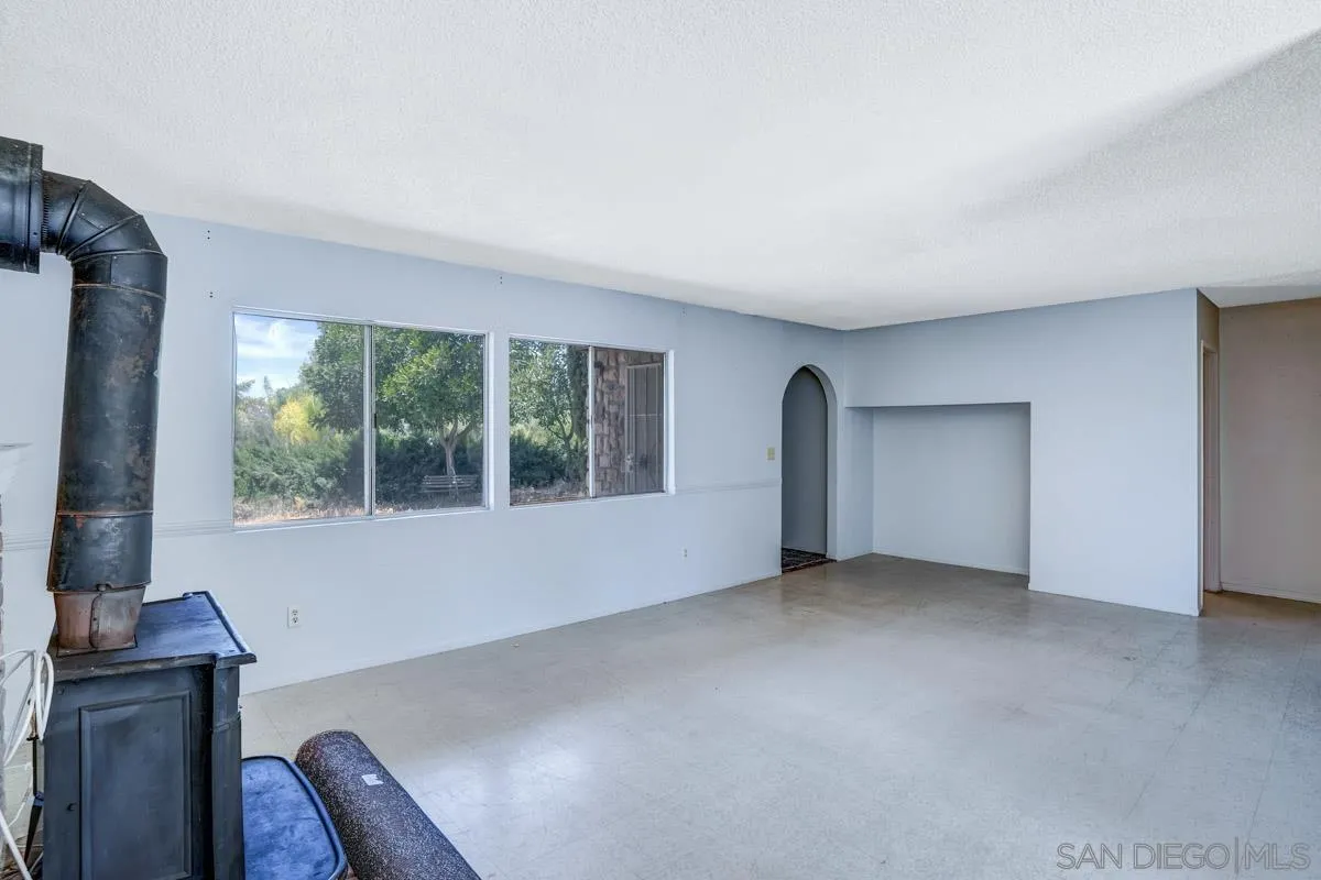 14035 Proctor Valley Road Jamul, CA 91935 - Photo 16 of 53 a view of an empty room with a window