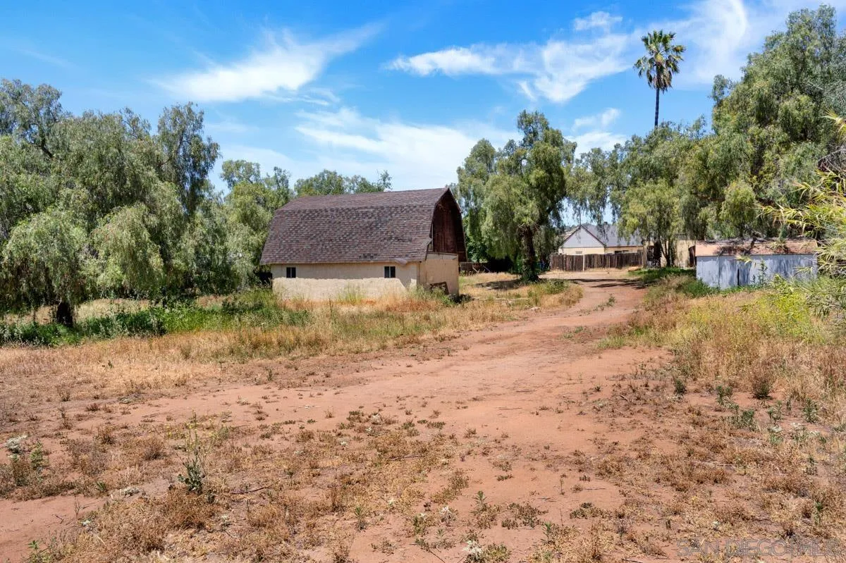 14035 Proctor Valley Road Jamul, CA 91935 - Photo 39 of 53 a view of a yard with a tree