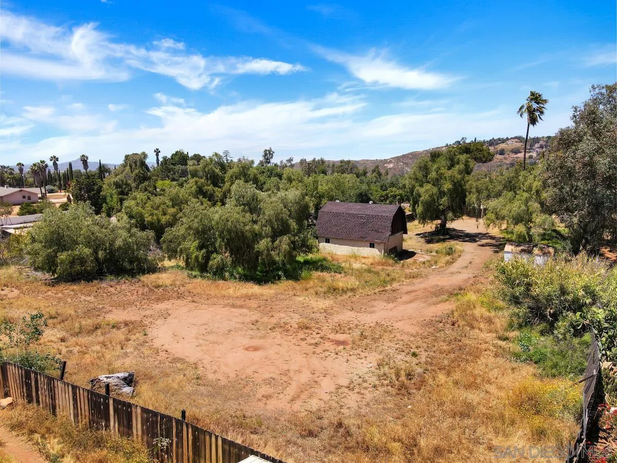 14035 Proctor Valley Road Jamul, CA 91935 - Photo 49 of 53 a view of a dry yard with wooden fence