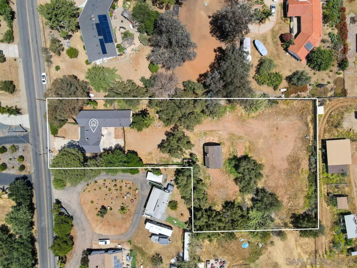 14035 Proctor Valley Road Jamul, CA 91935 - Photo 6 of 53 an aerial view of a house with a lake view