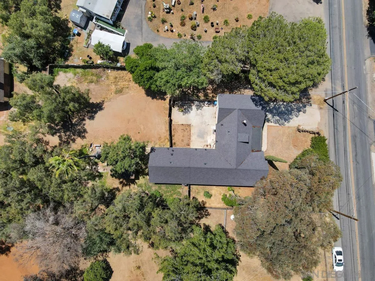 14035 Proctor Valley Road Jamul, CA 91935 - Photo 7 of 53 an aerial view of a house with a yard