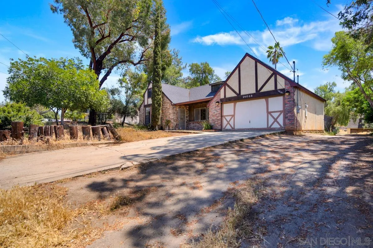 14035 Proctor Valley Road Jamul, CA 91935 - Photo 10 of 53 a view of a house with a yard