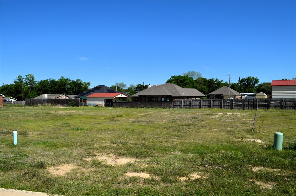 314 Preston Road Mabank, TX 75147 - Photo 1 of 4 a view of a lake with a yard