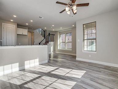 4717 Ladrillo Lane McKinney, TX 75070 - Photo 11 of 24 Unfurnished living room with recessed lighting, stairs, a ceiling fan, and light wood finished floors