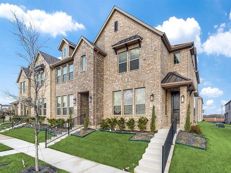 4717 Ladrillo Lane McKinney, TX 75070 - Photo 2 of 24 View of front of home with brick siding and a front yard