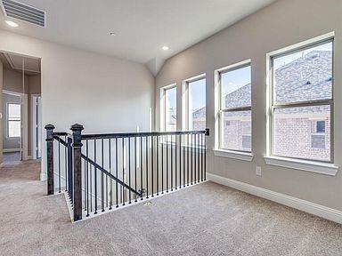 4717 Ladrillo Lane McKinney, TX 75070 - Photo 5 of 24 Hallway with attic access, light carpet, an upstairs landing, and recessed lighting