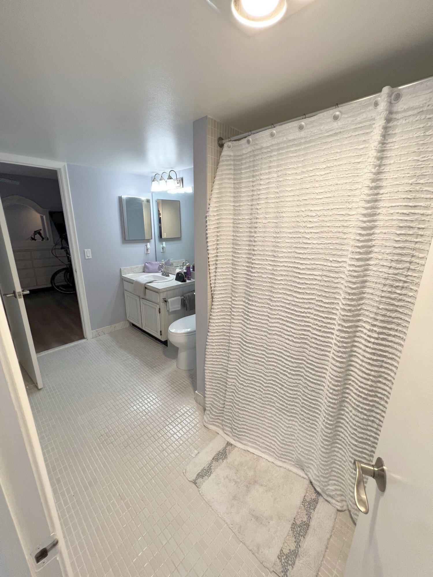 1 Royal Palm Way, Unit 3050 Boca Raton, FL 33432 - Photo 11 of 24 a bathroom with a sink and a mirror