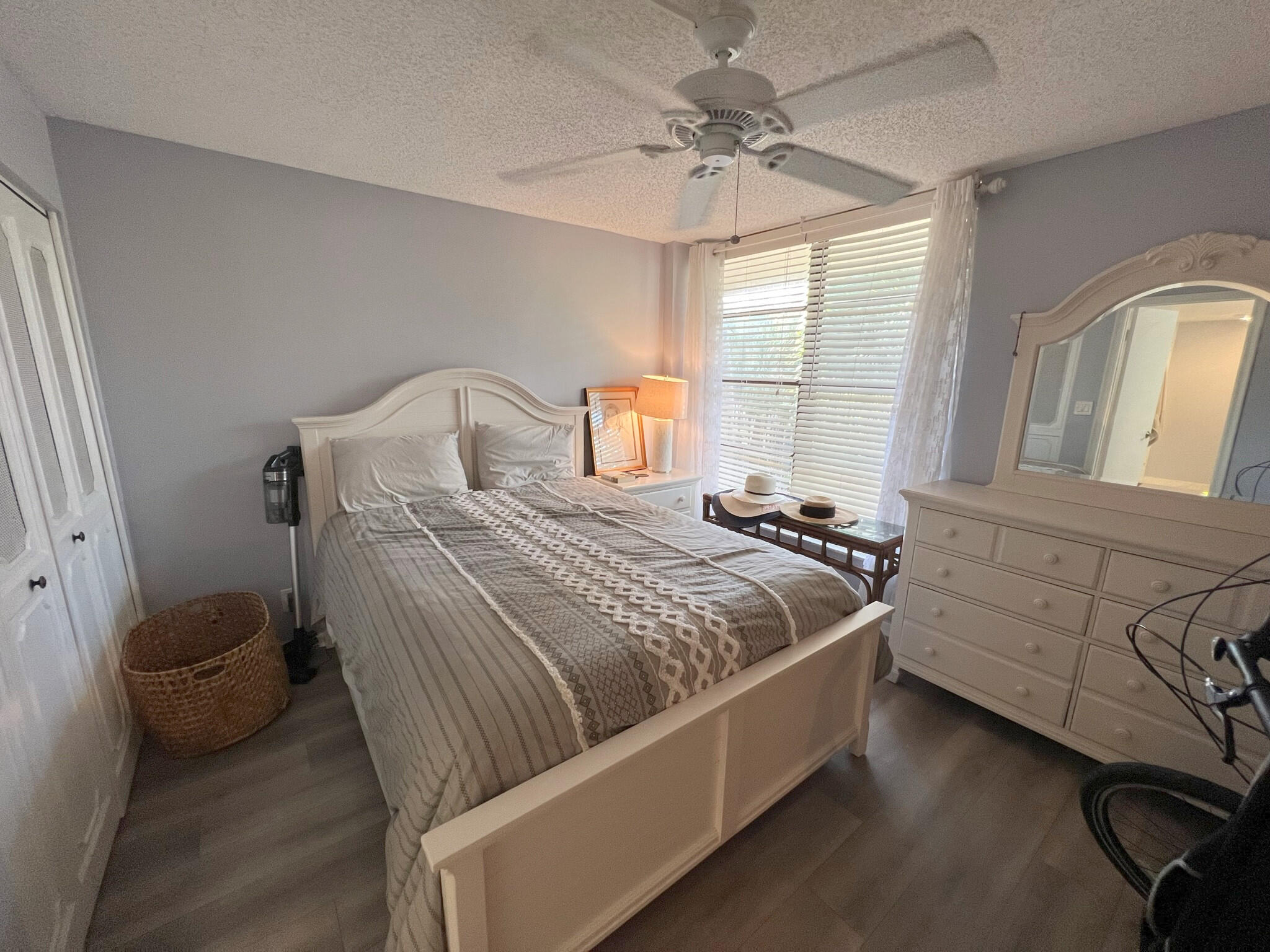 1 Royal Palm Way, Unit 3050 Boca Raton, FL 33432 - Photo 15 of 24 a bedroom with a bed and window