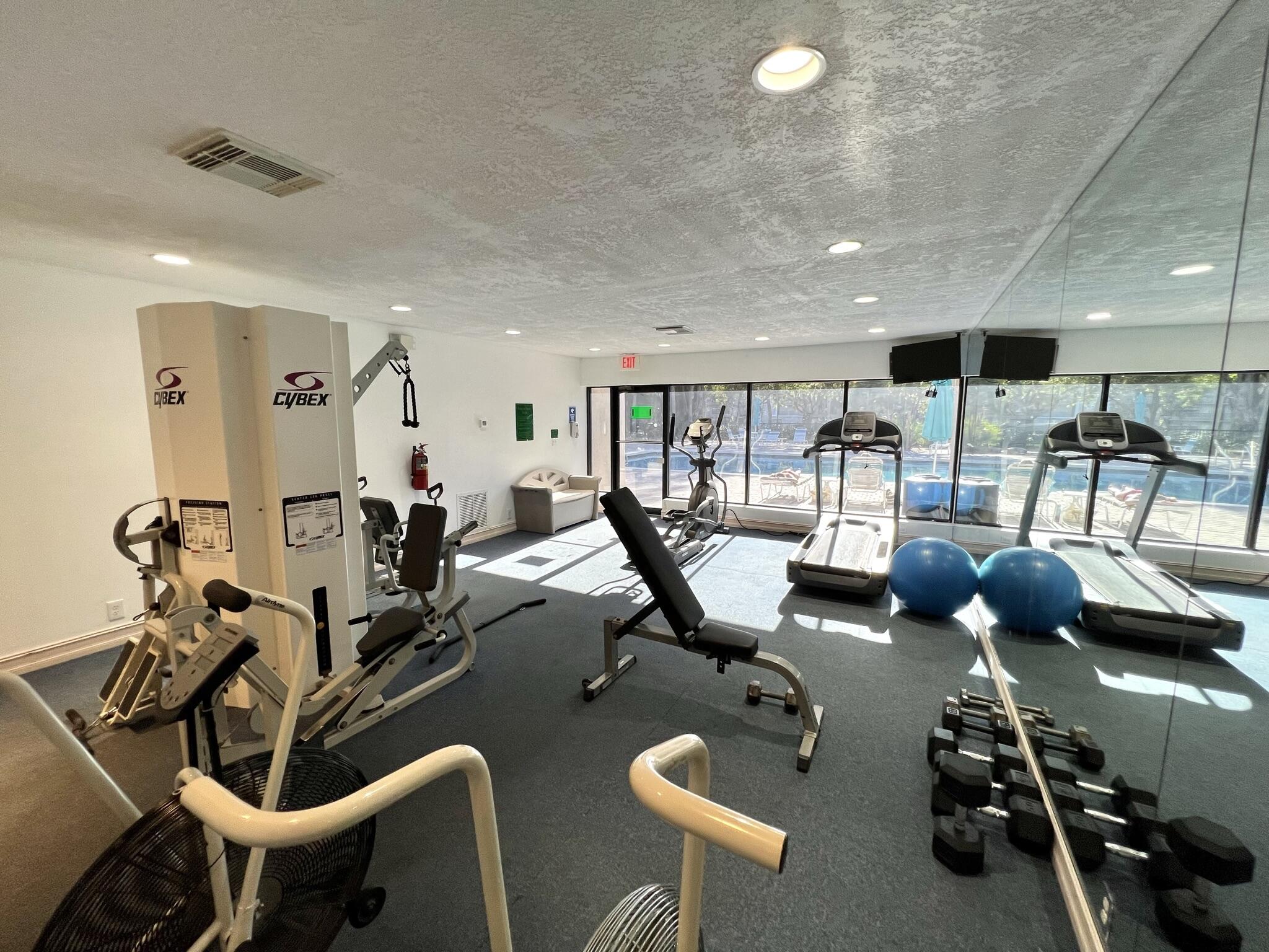 1 Royal Palm Way, Unit 3050 Boca Raton, FL 33432 - Photo 20 of 24 a room with gym equipment