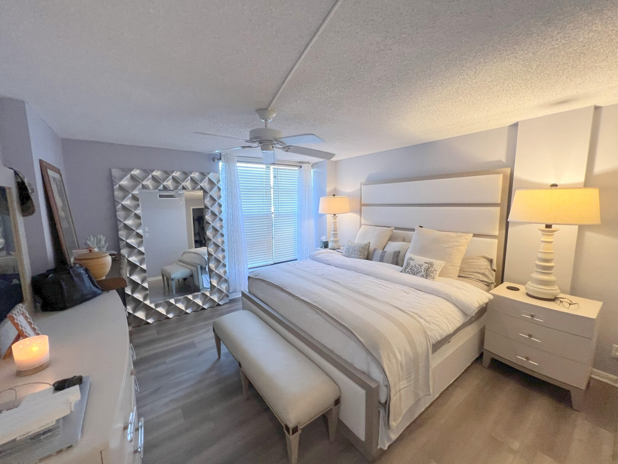 1 Royal Palm Way, Unit 3050 Boca Raton, FL 33432 - Photo 8 of 24 a bedroom with bed and wooden floor