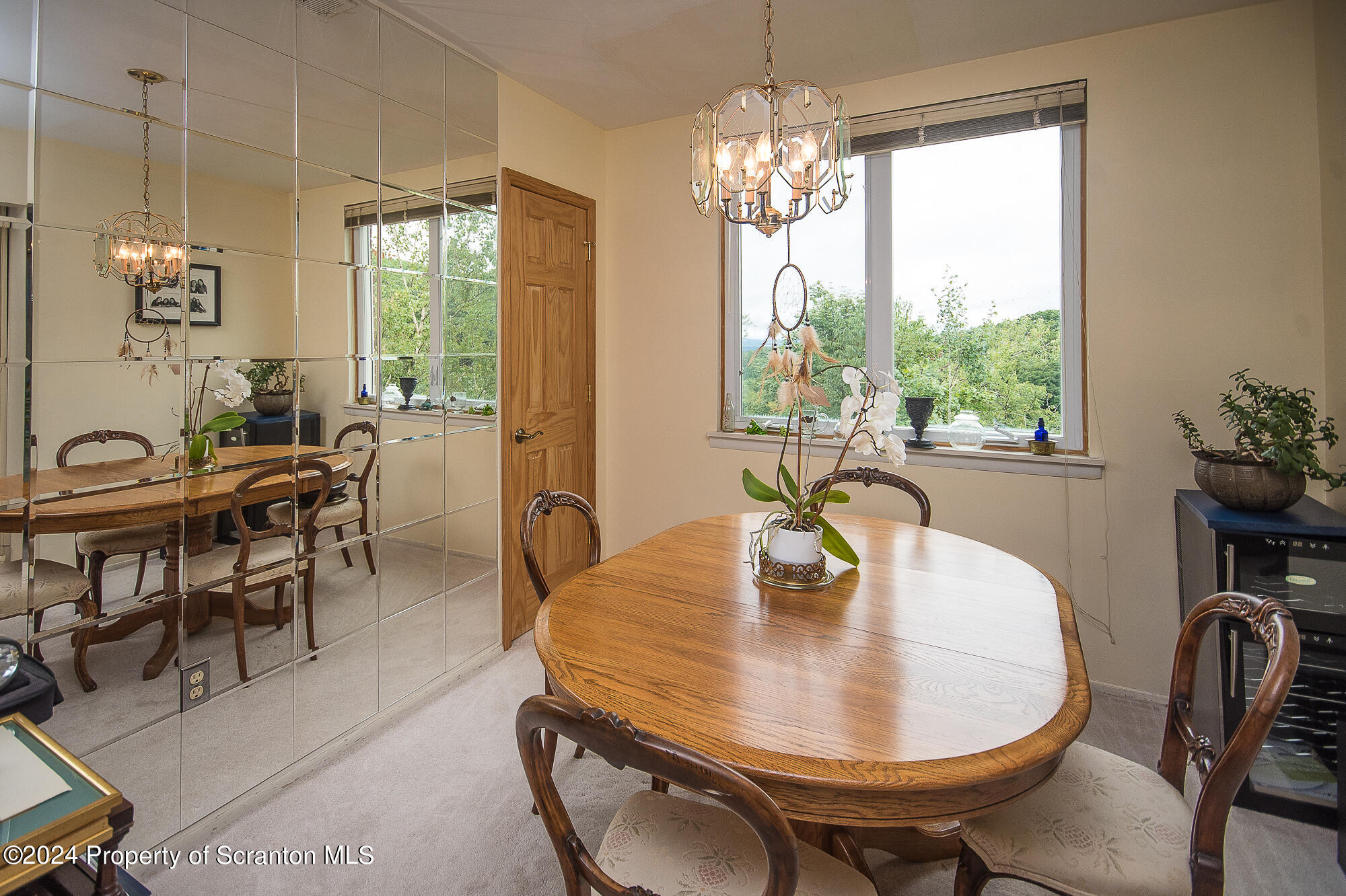1311 Summit Pointe Scranton, PA 18508 - Photo 3 of 29 a dining room with furniture a chandelier and window
