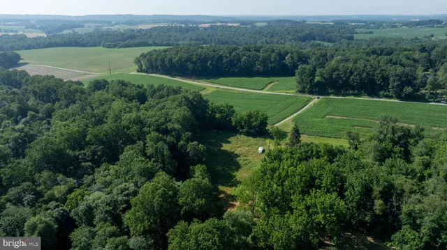 a view of a lake with a big yard