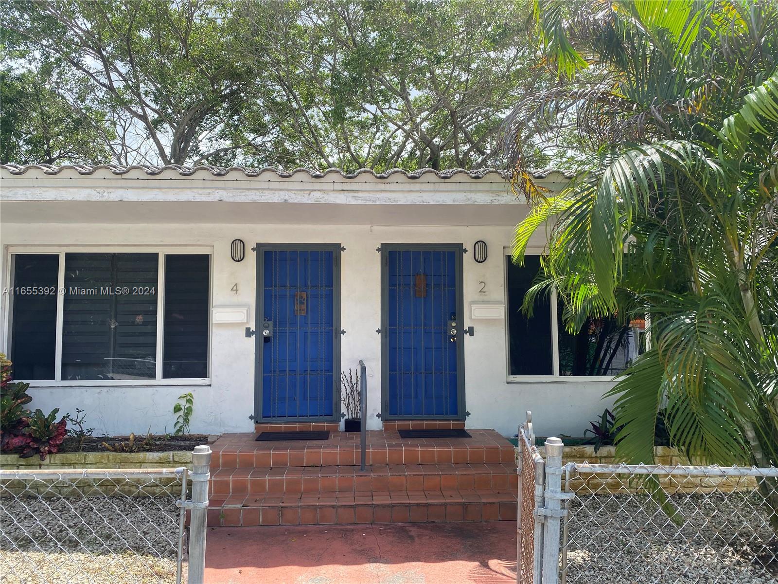 2 Northeast 45th Street, Unit 4 Miami, FL 33137 - Photo 2 of 15 a front view of house with yard