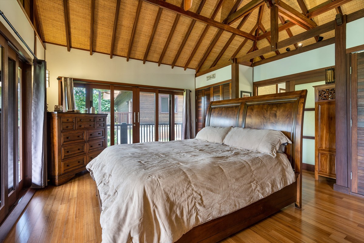 568 U Kamalu Road Kapaa, HI 96746 - Photo 5 of 11 a bedroom with a bed next to a window
