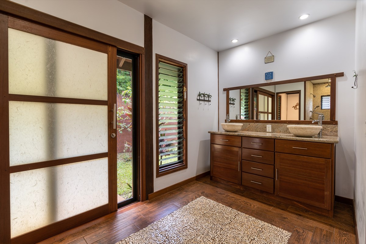 568 U Kamalu Road Kapaa, HI 96746 - Photo 6 of 11 a room with a bed and a dresser