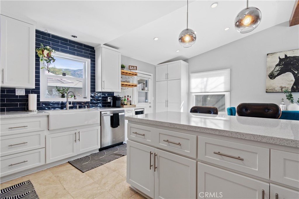 275 Mountain View Street Altadena, CA 91001 - Photo 13 of 30 a kitchen with cabinets and window