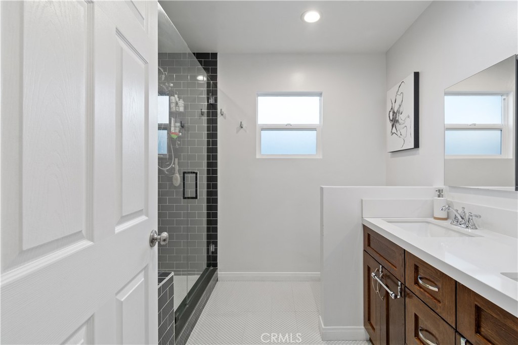 275 Mountain View Street Altadena, CA 91001 - Photo 18 of 30 a bathroom with a sink a vanity and a mirror