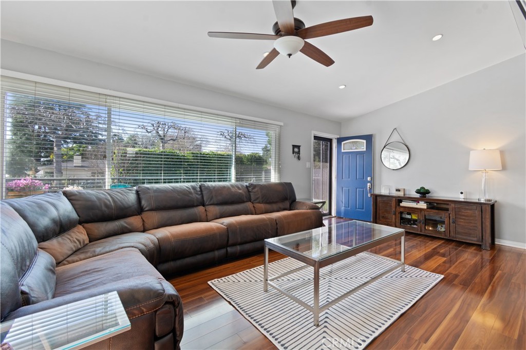 275 Mountain View Street Altadena, CA 91001 - Photo 6 of 30 a living room with furniture a ceiling fan and a large window