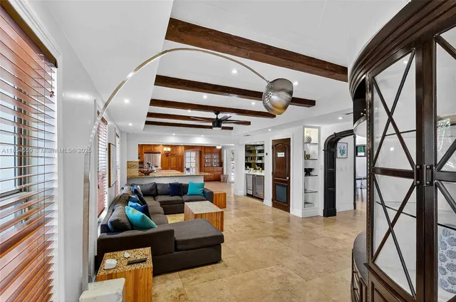 a living room with a table and gym equipment