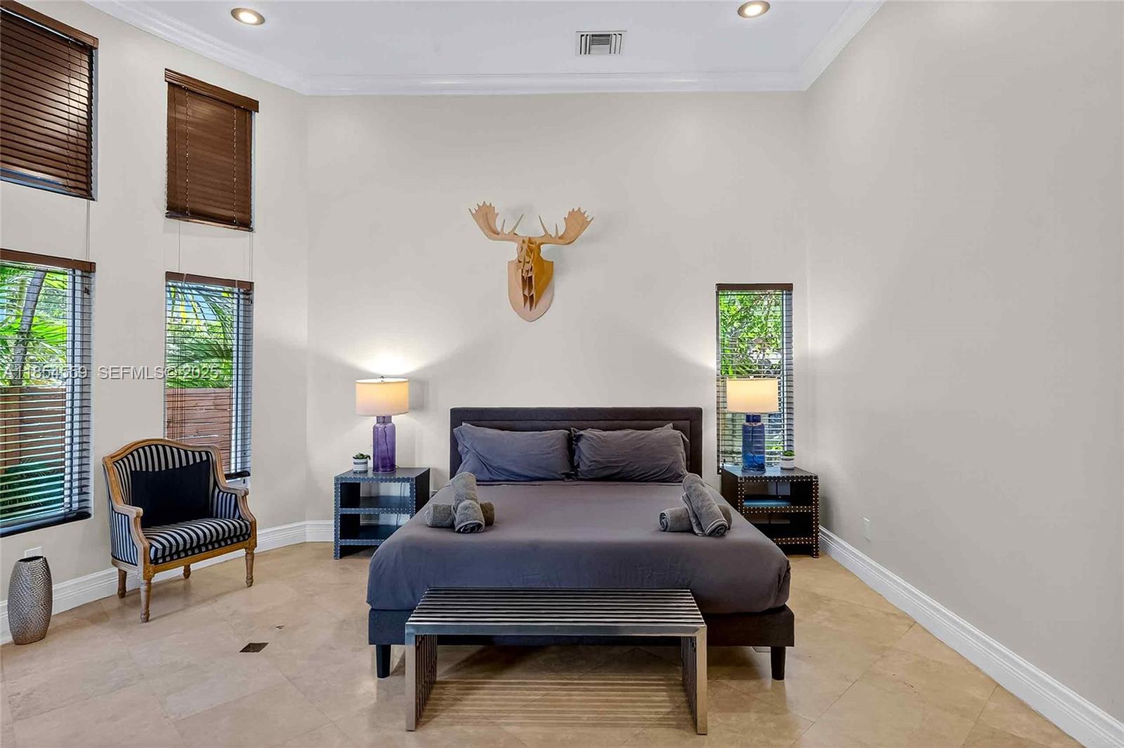 1051 Northeast 89th Street Miami, FL 33138 - Photo 37 of 71 a living room with furniture and a window