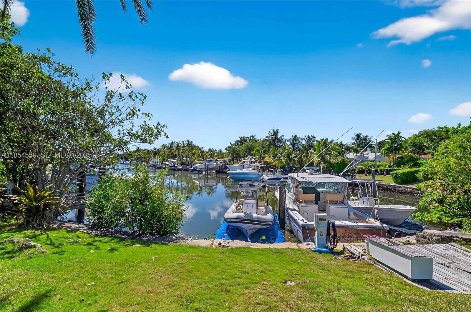 1051 Northeast 89th Street Miami, FL 33138 - Photo 4 of 71 a view of a lake with outdoor space