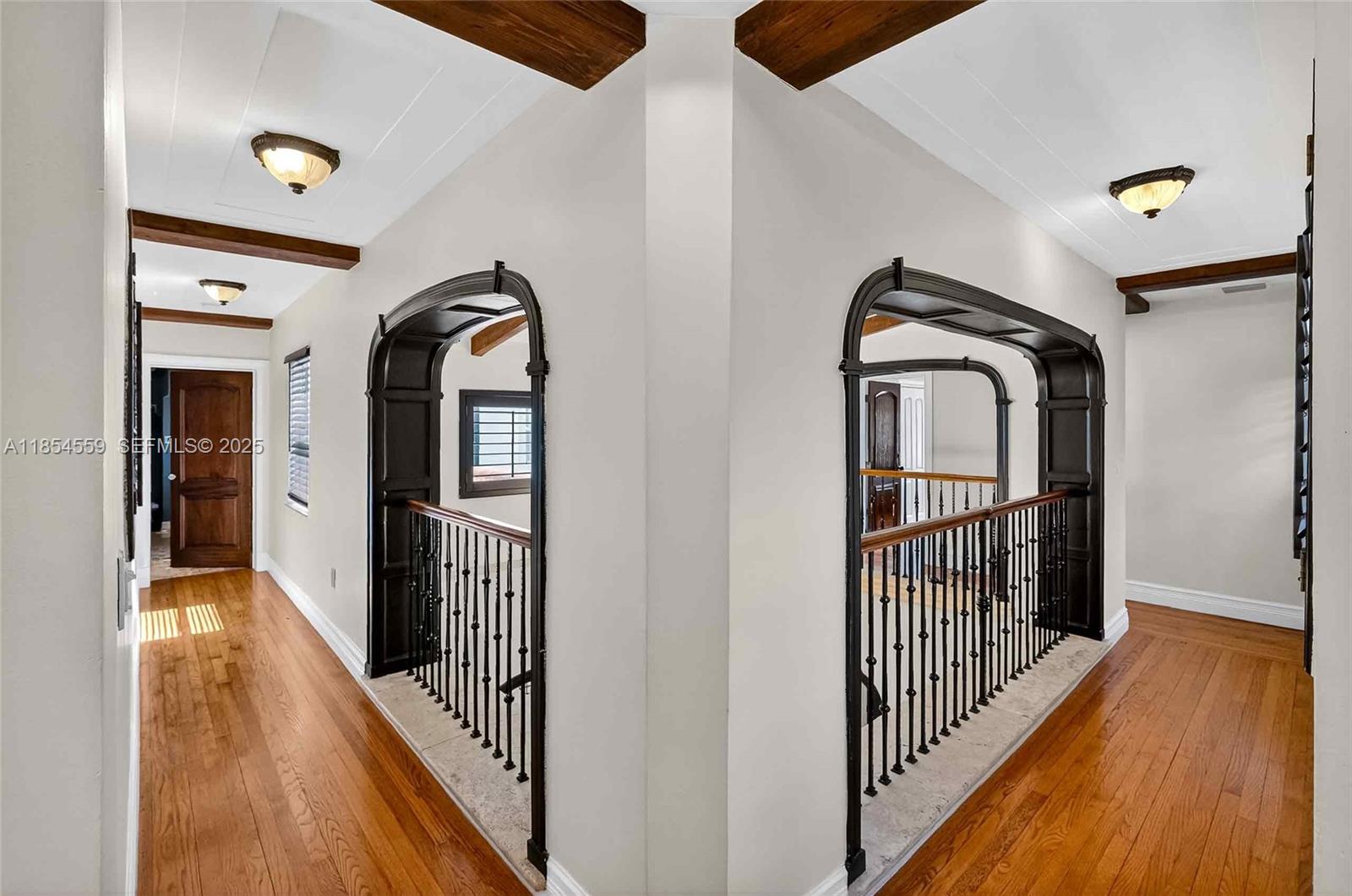 1051 Northeast 89th Street Miami, FL 33138 - Photo 46 of 71 a view of gallery with wooden floor