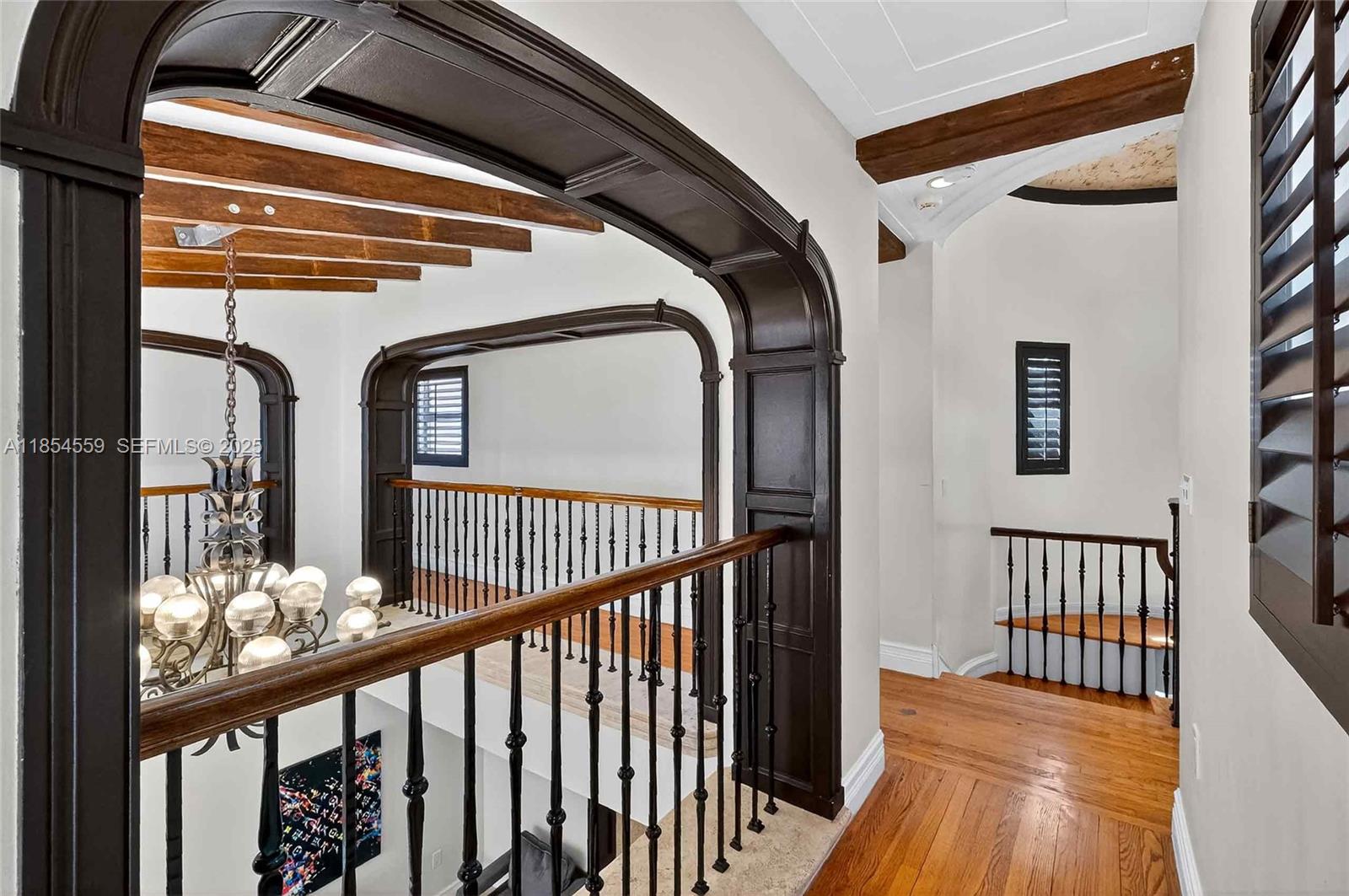 1051 Northeast 89th Street Miami, FL 33138 - Photo 49 of 71 a view of staircase with railing and a rug