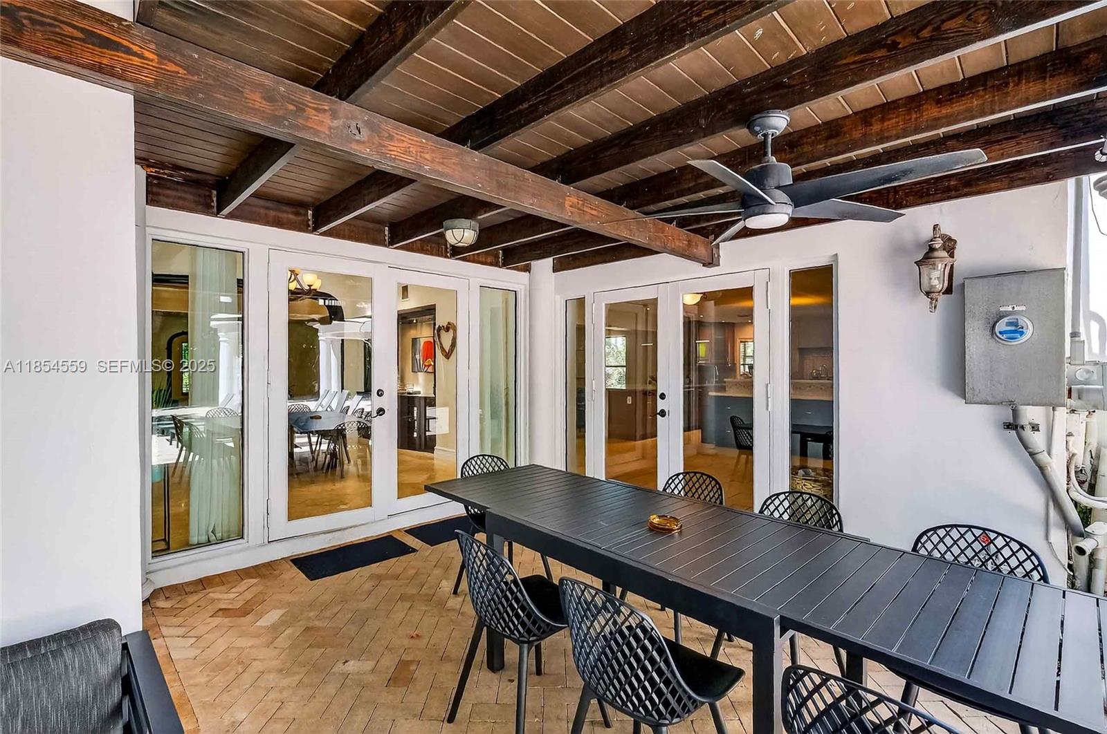 1051 Northeast 89th Street Miami, FL 33138 - Photo 10 of 71 a view of a dining room with furniture window and wooden floor