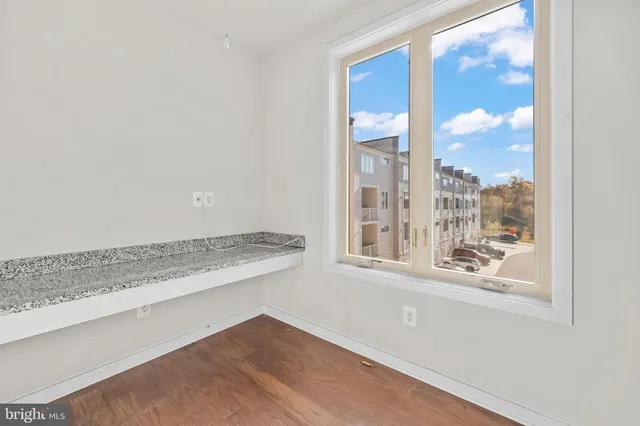 a view of a room that has a window in it