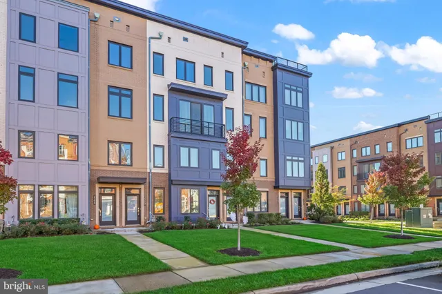 a view of a wrought iron fences in front of house