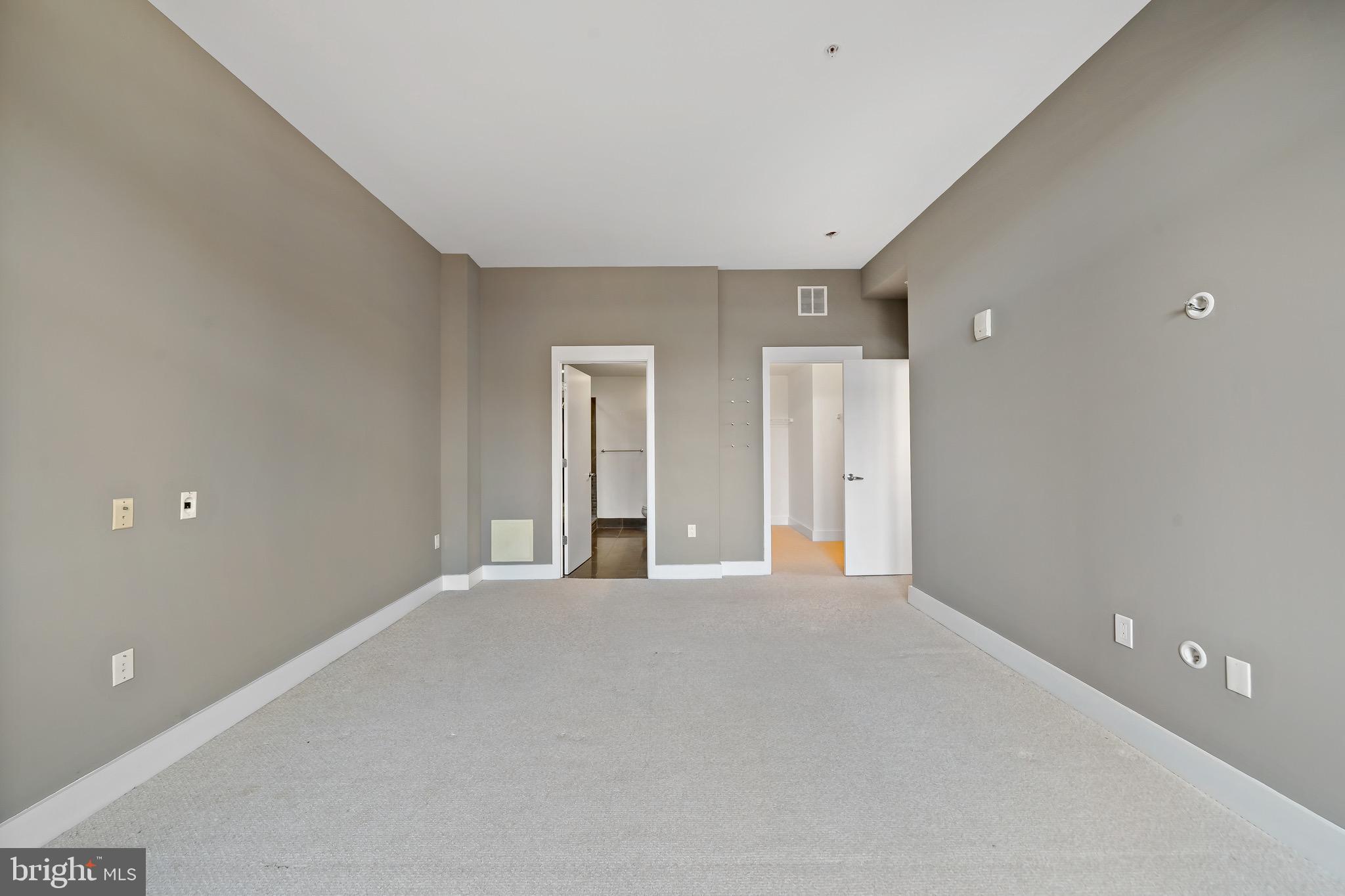 1101 Locust Street, Unit 7I Philadelphia, PA 19107 - Photo 11 of 27 a view of an empty room with a window