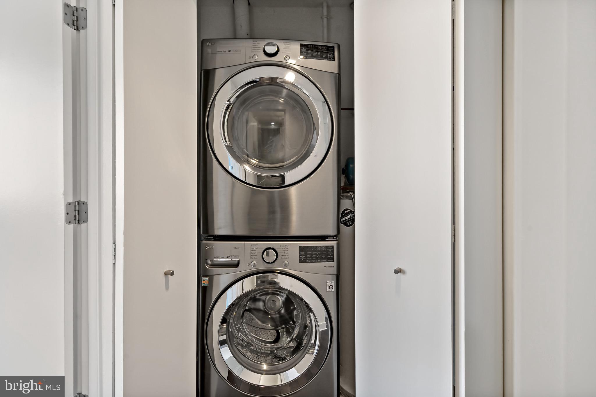 1101 Locust Street, Unit 7I Philadelphia, PA 19107 - Photo 19 of 27 a utility room with dryer and washer