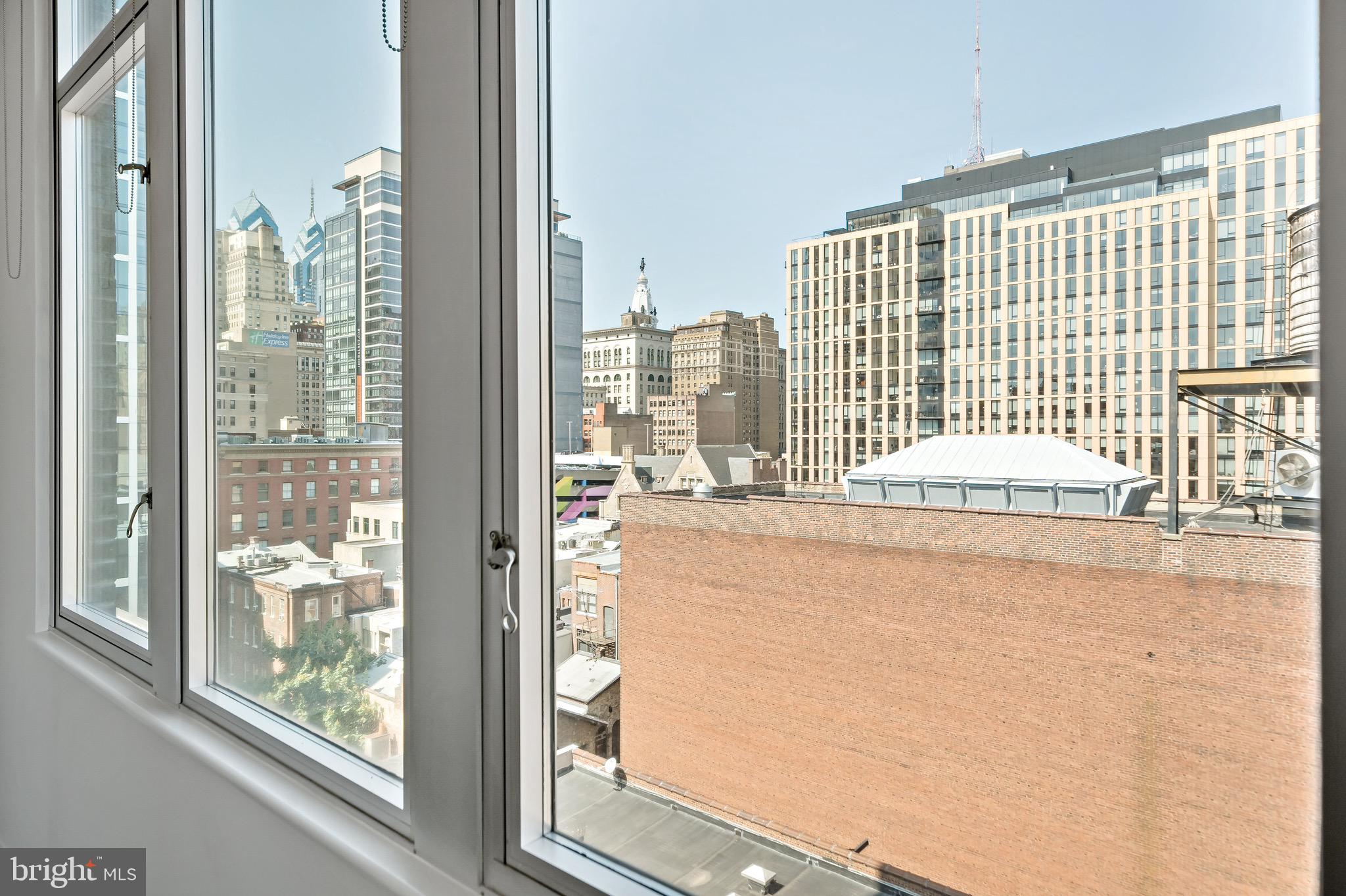 1101 Locust Street, Unit 7I Philadelphia, PA 19107 - Photo 5 of 27 a view of a balcony with a white door