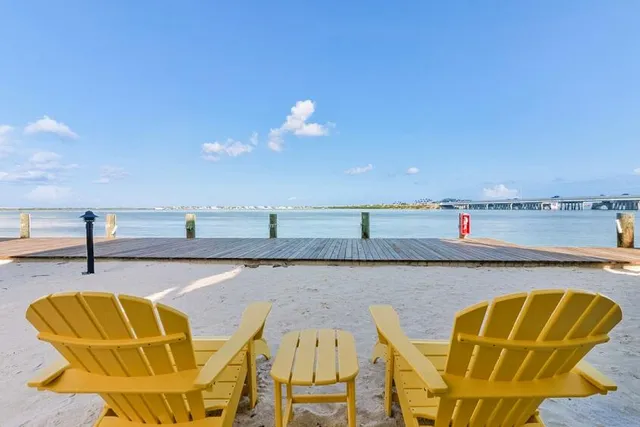 a view of swimming pool with seating space