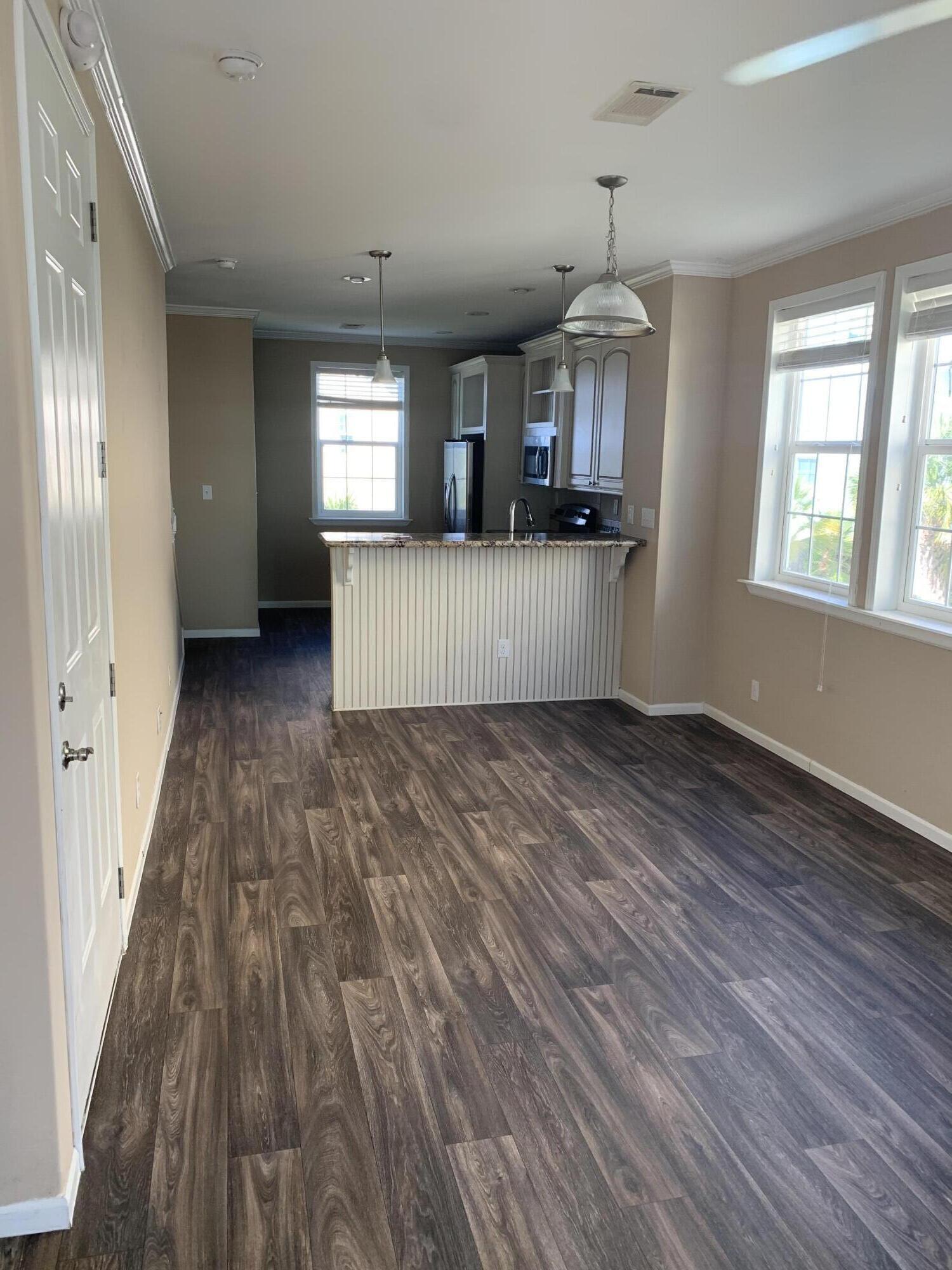 28511 Channel View Drive Summerland Key, FL 33042 - Photo 3 of 14 wooden floor in an empty room with a window