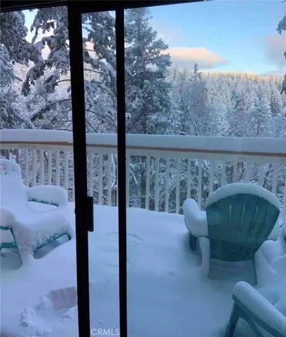 a view of balcony with furniture