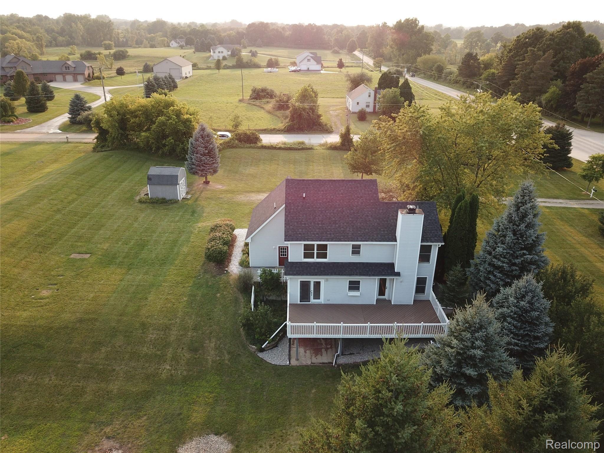 4191 West Coon Lake Road Howell, MI 48843 - Photo 14 of 32 BackDeckView.JPG