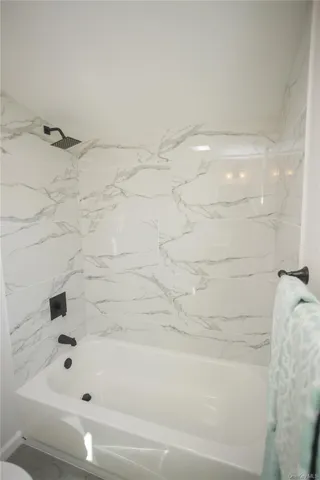 a bathroom with a bathtub