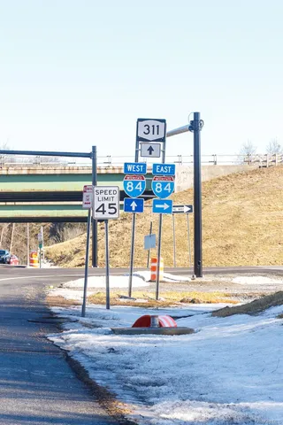 a view of a living room and wooden floor