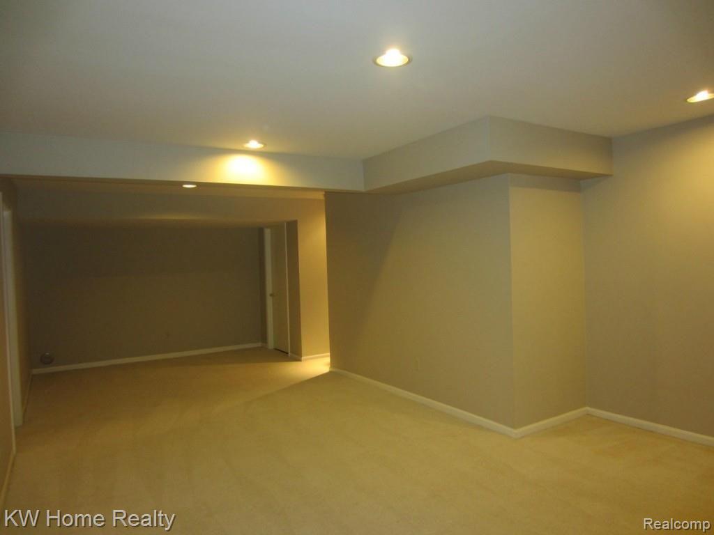 2210 London Bridge Drive, Unit 7 Rochester, MI 48307 - Photo 17 of 21 LONDON-FAMILY ROOM LOWER LEVEL VIEW2.jpg