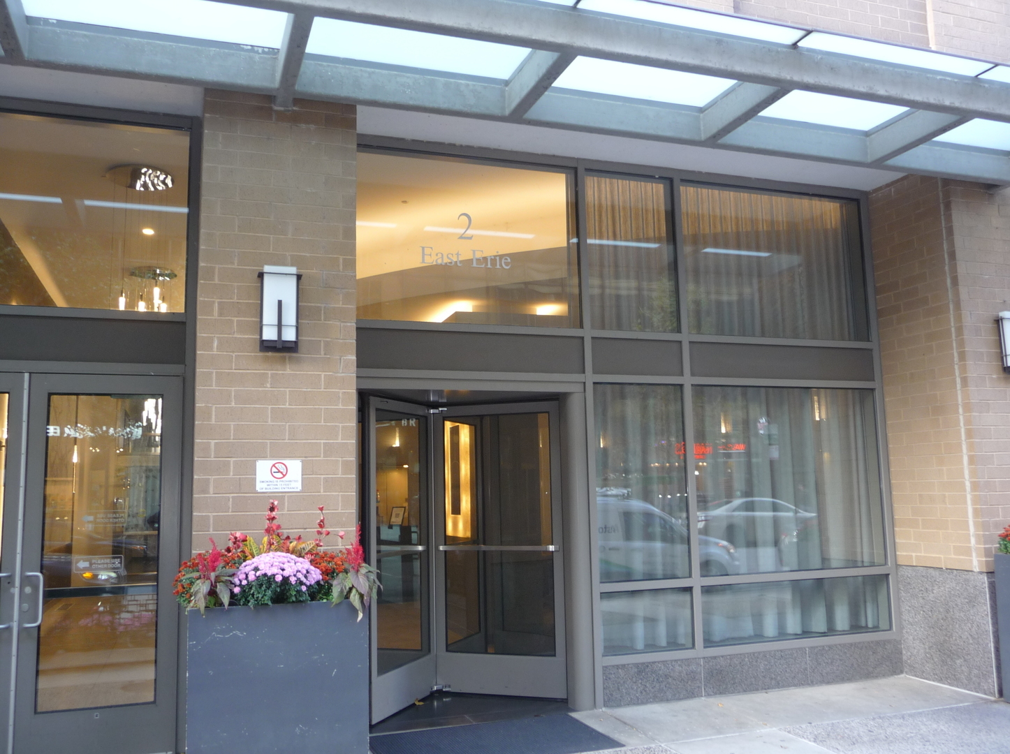 2 East Erie Street, Unit 2204 Chicago, IL 60611 - Photo 2 of 25 a flower pot on the side of a building