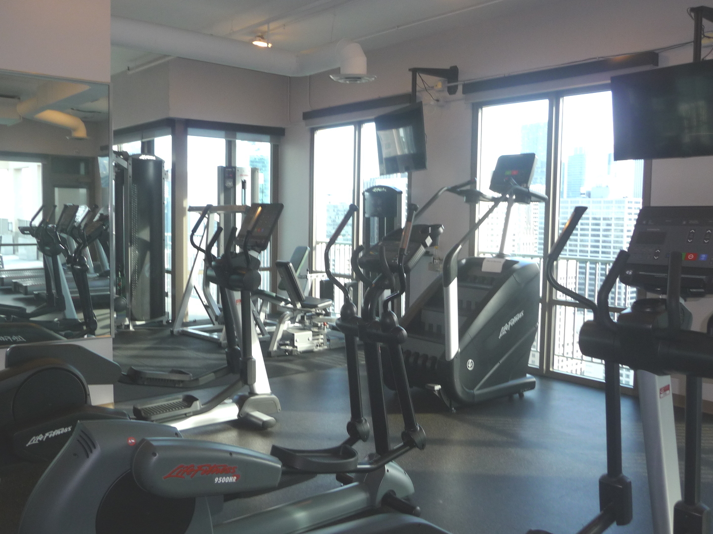 2 East Erie Street, Unit 2204 Chicago, IL 60611 - Photo 23 of 25 a view of a room with gym equipment
