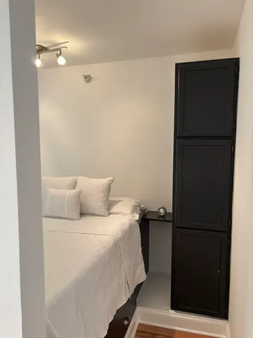 a bedroom with a bed