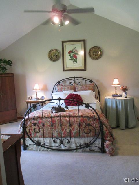 343 Forest Road Nazareth, PA 18064 - Photo 19 of 32 a bed sitting in a room next to a lamp