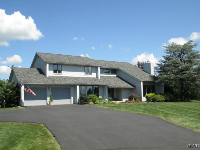 343 Forest Road Nazareth, PA 18064 - Photo 2 of 32 a view of a house with a yard and potted plants