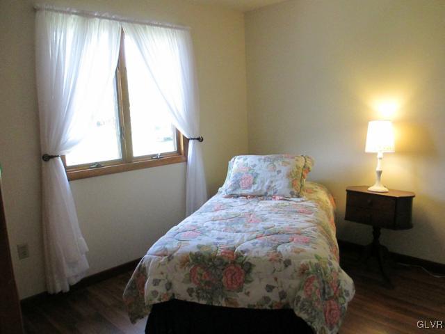 343 Forest Road Nazareth, PA 18064 - Photo 22 of 32 a bed sitting in a bedroom next to a window